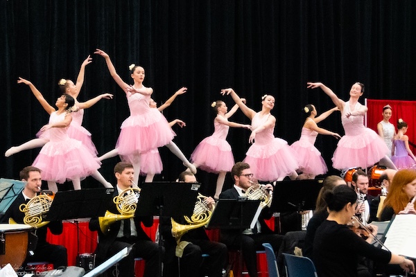 Violinists playing with the Riverside Opera Company